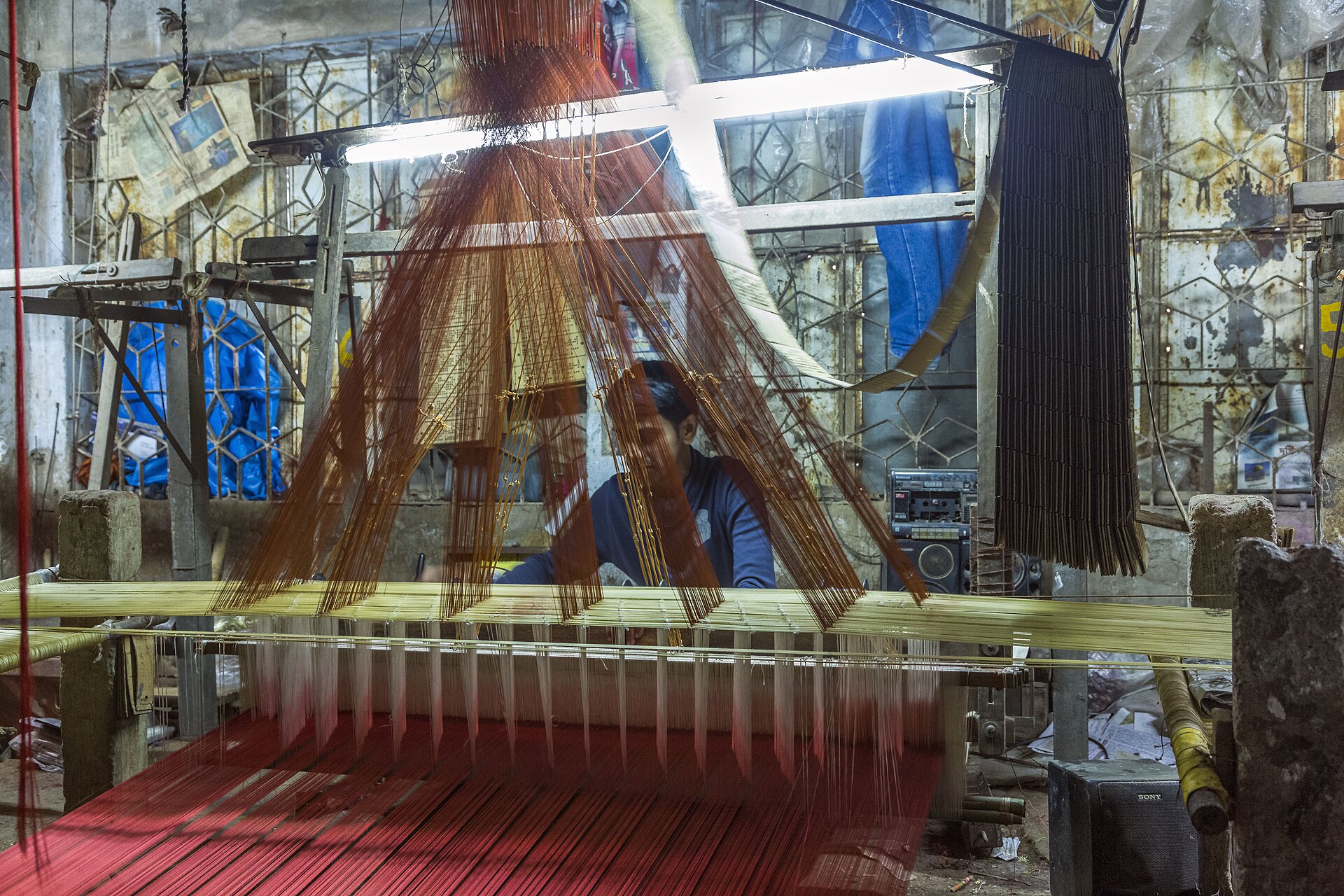 A weaver crafting Banarasi silk
