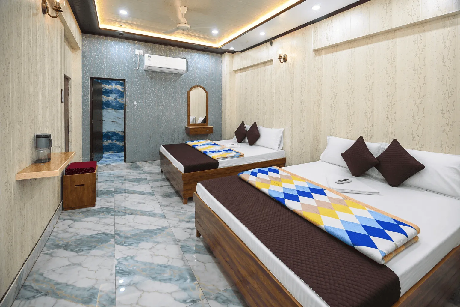 Family room at Kashi King Luxury Stay, space for pilgrims travelling together, Varanasi